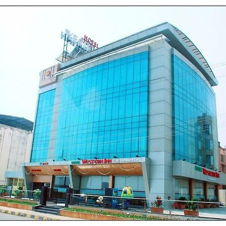 Hotel Western Inn Vasai Bagian luar foto